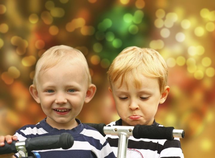 Happy boy, sad boy on scooter – Handling kids’ present expectations at Christmas